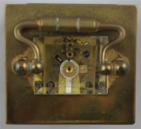 An early 20th century brass miniature carriage timepiece, 2.5in. in travelling case